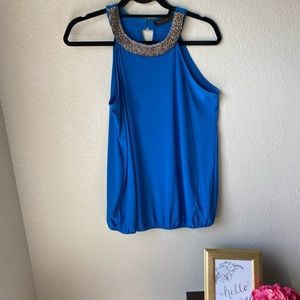 Limited dressy top with neckline detail